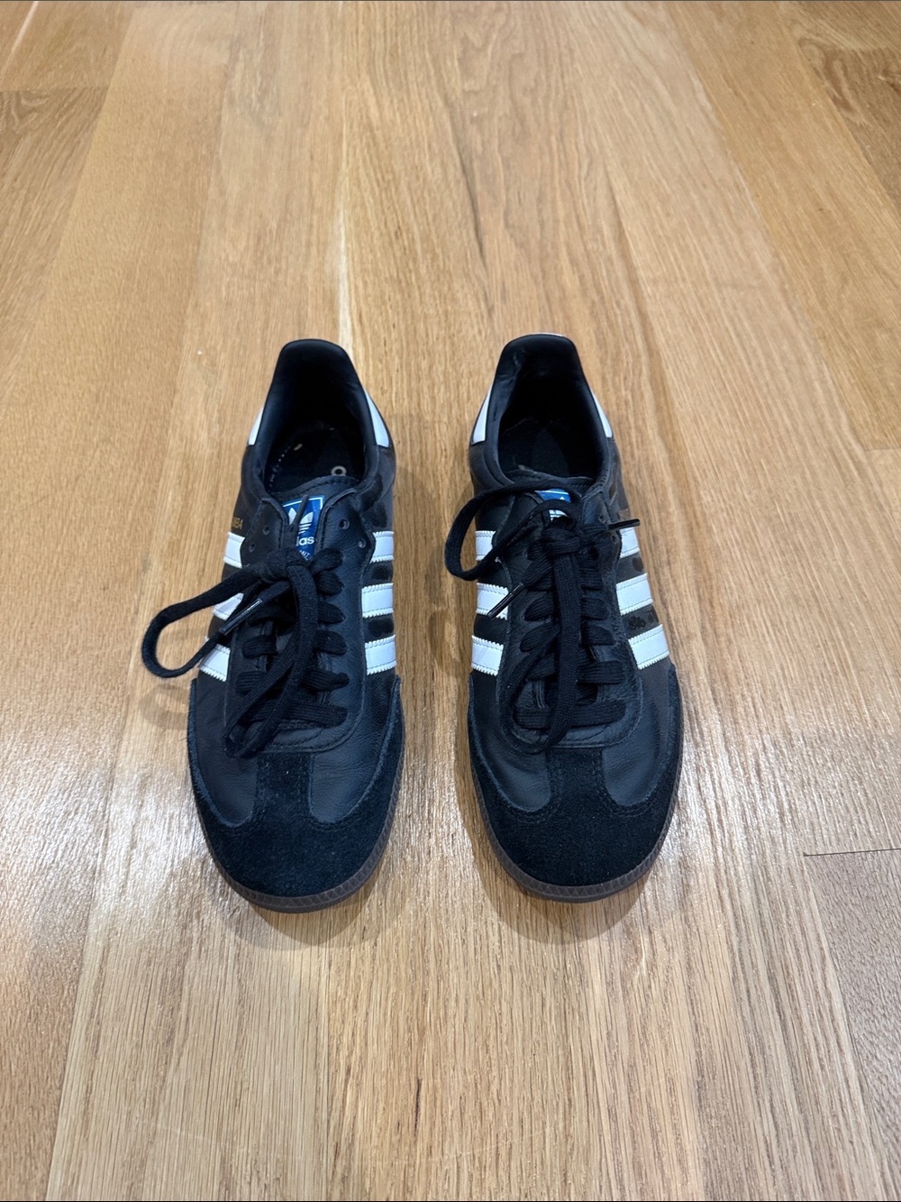 adidas woman's Black Sneakers with White Stripes